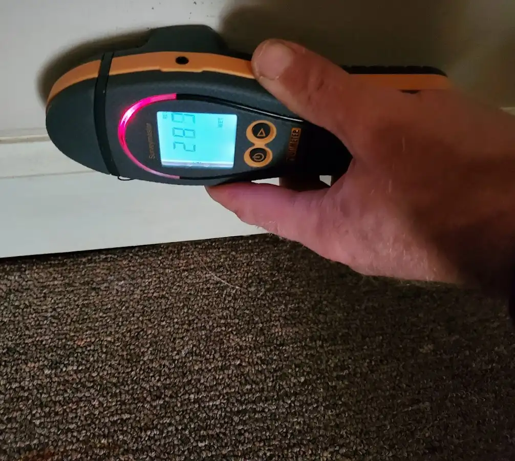 Moisture detection at baseboard during Storm Damage Restoration in South Lebanon